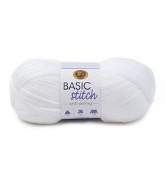 a white ball of yarn with the words basic stitch written in purple and blue on it