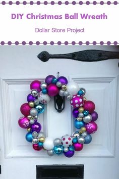 a christmas ball wreath is hanging on the front door with ornaments around it and an ornament that says diy christmas ball wreath dollar store project