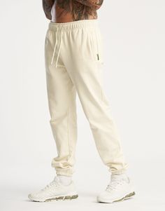 The lounge-to-street look is here. The Basic Jogger Sweatpants are the iconic sweats for a staple wardrobe. Featuring an elastic waistband and cuffs matched with a relaxed fit that is laid back but not baggy. Fleece lining on the inside offers the warmth you need all day - Regular Fitting - ECHT Woven Tag Detail - Reinforced Stitching - Comfortable Cuff Bottom - Ribbed Waistband for secure support 100% Cotton Shawn wears a Small and is 75kg Staple Wardrobe, Street Look, Mens Joggers, Jogger Sweatpants, Wardrobe Staples, Sweatpants, Stitching, Lounge, Relaxed Fit