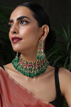 A beautifully handcrafted neckpiece worked in gold, finished with an array of semi-precious gemstone drops and encrusted with kundan. This choker set is based in silver alloy plated with 22k gold. Necklace Closure - Adjustable Dori Earrings Closure - Push Back Necklace - 14 inches Earrings - 3.5 inches Style Tip - A perfect choker for someone who's styling decisions always start and end with putting timeless classics together to create a magical and unique look. An accessory so versatile, we are Kundan Multi-stone Jewelry Gift, Kundan Multi-stone Necklace As Gift, Festive Kundan Jewelry With Stones, Ceremonial Jeweled Necklaces For Diwali, Celebration Chandbali Jewelry With Stones, Chandbali Multi-stone Necklace For Gift, Festive Multi-stone Kundan Necklace For Gift, Fusion Kundan Necklaces With Stones, Ceremonial Kundan Jeweled Necklace