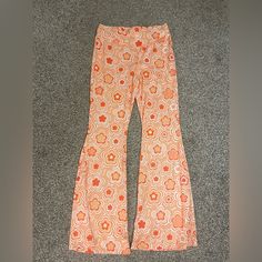 Shein Orange Hippie Flare Pants. Very Elastic- Legging Type Material. Never Worn. Spring Wide Leg Bottoms With Retro Print, Wide Leg Bottoms With Retro Print For Spring, Retro Bottoms With Elastic Waistband For Spring, Retro Wide Leg Bottoms With Elastic Waistband, Retro Bottoms With Elastic Waistband For Loungewear, Retro Print Bottoms For Spring, Wide Leg Bottoms With Retro Print For Summer, Retro Flare Bottoms For Summer, Casual Bottoms With Retro Print For Spring