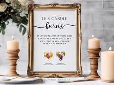 this candle burns sign is next to two candles and a vase with flowers in it