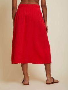 A midi skirt with a hint of bohemian romance, thanks to its breezy Double Gauze fabric and easy pull-on waist that's comfortable and flattering. (This one comes in Cherrybomb.) Wear it with the Wyoming Tank. | Women's Safa Skirt in Cherrybomb | Ethical Essentials