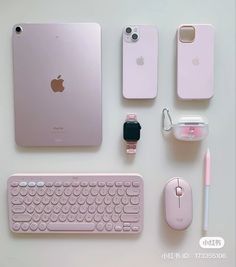 an apple computer, keyboard, mouse and other items are arranged on a table top