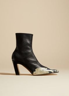 The Nevada Stretch High Boot in Black with Natural Python-Embossed Leather Luxury Leather Boots With Snake Print, Elegant Leather Snake Print Boots, Leather Snake Print Heeled Boots With Pointed Toe, Snake Print Leather Heeled Boots With Pointed Toe, Urban Cowboy, Cowboy Boot, Nappa Leather, Embossed Leather, Scales