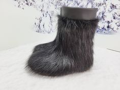 Children boots from natural fur of a nutria!  Waterproof, wearproof, warm boots that withstand up to 50 degrees Celsius below zero.  Every mother's dream! Insulated by genuine sheepskin.  Only high quality materials are used, so this amazing boots will last for a long time.  COLORS: These beautiful boots are available in natural varycolored, black, brown, white, lemon, taupe color.   ------------------------------------------------------------------------------------------------------  SIZES (EU Yeti Boots, Fox Fur Boots, Boots For Kids, Toddler Snow Boots, Kids Winter Boots, Fur Keychain, Star Boots, Warm Boots, Beautiful Boots