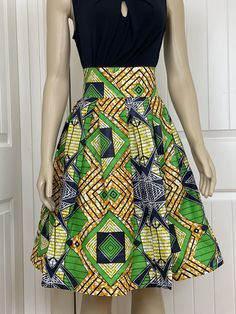 This multicolor skirt accentuates your hips and gives you a brilliant outlook. Long: 25 inches. 3 inches waist band. Hand wash cold, warm iron to maintain its brilliant look. Ready to ship. Shipping is free! You can order custom size to ensure good fit but below is our size variation UK 4, US 0 - Bust : 30 Waist : 22.5 Hip: 32.5 UK 6, US 2 - Bust : 33 Waist : 25.5 Hip: 35 UK 8, US 4 - Bust : 34 Waist : 26.5 Hip: 36 UK 10, US 6 - Bust : 36 Waist : 28.5 Hip: 38 UK 12, US 8 - Bust : 38 Waist : 30.5 Multicolor Fitted Midi Skirt, Skirt African Print, African Skirt, Fashion Over Fifty, Plus Size Skirt, African Skirts, Ankara Skirt, Multicolor Skirt, Gold Skirt