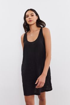 A person with long hair wears a sleeveless black YESSIE LINEN DRESS by Velvet by Graham & Spencer featuring inseam patch pockets and a simple necklace Sweater Knit Skirt, Velvet Tees, Black Linen Dress, Swim Brands, Linen Tank, Mini Tank Dress, Dress Picture, Knit Skirt, Knit Jacket