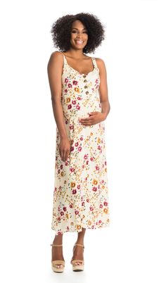 Breeze through pregnancy and nursing in style! Light as a whisper with a soft hand, this boho-chic dress is as lovely to wear as it is to look at. Its shoulder straps are bra-friendly and the smocked elastic back ensures a perfect fit. When it's time to nurse, simply unbutton the front for quick nursing access. Mommy can match with her mini-me in our Catalina Kids Dress(sold separately)! Rayon. Machine wash cold, gentle. Line dry. High point shoulder(excluding shoulder straps) to hem measures 45 Sundress Style, Nursing Maxi Dress, Maternity Nursing Dress, Midi Sundress, Boho Chic Dress, Nursing Dress, Silk Midi Dress, Maternity Nursing, Floral Sleeveless