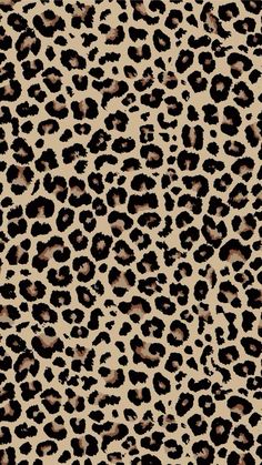 an animal print background with black and brown spots