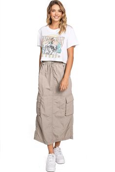 Chic, parachute skirt with an elastic waistband, a drawstring cinch tie and cargo pockets down the sides. Pair it with a graphic tee and sneakers for an effortless streetwear look. CARE | Machine Wash Cold CONTENTS | 100% Nylon MEASUREMENTS | 33"/85 cm Top to Bottom (Size Small) MODEL | 5'8 - wearing a size Small IMPORTED Parachute Skirt, Short Denim Skirt, Cargo Skirt, Short Mini Dress, Knit Sweatshirt, Midi Maxi Dress, Skirt Leggings, Basic Tops, Solid Dress