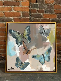 a painting with blue butterflies on it