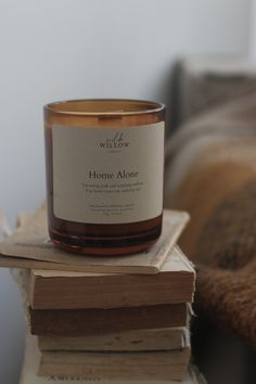 a candle sitting on top of some books