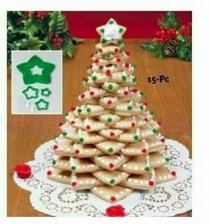 a christmas tree made out of cookies sitting on top of a table