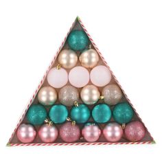 a triangle shaped christmas ornament with balls and candy canes