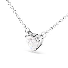 Indulge in the exquisite allure of this heart-shaped pendant necklace. Glistening with a brilliant 1.0 cttw of lab-grown diamonds, this pendant is crafted from 14K white gold, exuding a timeless and luxurious look. The single diamond is precisely set in a 3-prong setting, maximizing its fire and sparkle. The F-G color and VS1-VS2 clarity of the diamond enhance its radiance and beauty, making it a stunning addition to your jewelry collection. This heart stud pendant hangs elegantly from an 18-inc Heart Shaped Pendant Necklace, Solitaire Pendant Necklace, Heart Shaped Diamond, Solitaire Pendant, Heart Studs, Ring Collections, Diamond Heart, Cable Chain, Spring Rings