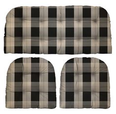 two black and white checkered cushions on top of each other, with the same pattern