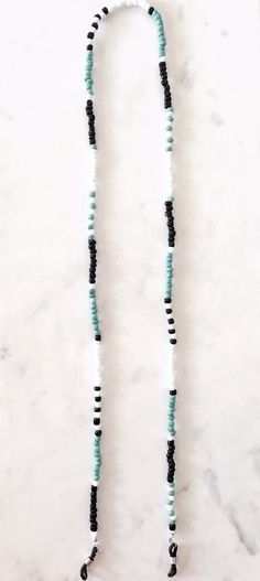 "Bright Blue, Black and White Beaded Eyeglass / Sunglass Holder. Strung with high quality bead thread. Approx. 26\" long with adjustable ends to fit all glasses." Beaded Glasses Chain, Beaded Eyeglass Chain, Eyeglass Necklace, Glasses Chains, Bracelets Design, Clay Bracelet, Sunglass Chain