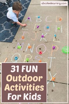 a child playing with letters and numbers on the ground