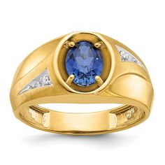 a yellow gold ring with a blue sapphire and white diamonds