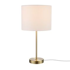 a lamp that is on top of a white surface with a cord attached to it