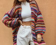 "Rainbow mohair cardigan with color stripes  HANDMADE  ONE SIZE PRE-ORDER ✔️25%wool ✔️24% mohair ✔️51% acrylic  ❗️If you have another preferences in dimensions please contact me ❗️ Dimensions: Length - 87 cm. /34.25 inch. Width - 65 cm. /25.5 inch. Sleeve lenght - 62 cm. /24.4 inch. Sleeve width - 27 cm. /10.6 inch.  Model measurements: Height - 1.7 cm/ 5'7\"  Bust - 90 cm/ 35.43\" Waist - 65 cm/ 25.5\" Hips - 92 cm/ 36.2\" Hand knit women's color mohair cardigan. Multi color knit cardigan great part of your outfit. This rainbow stripes cardigan is the best design in this color. Mohair knit cardigan is a beautiful cloth in your wardrobe especially this is an arm knit jamper Soft knit cardigan, oversized cardigan is the best women warm cardigan and women jamper.  Exclusive and beauty. Mohai Multicolor Cardigan, Knitted Stuff, Pull Mohair, Rainbow Cardigan, Soft Knit Cardigan, Warm Cardigan, Mohair Knit, Purple Cardigan, Plus Size Cardigans