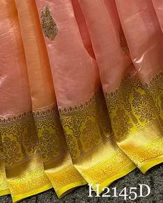 Product Detail: Design Details: Banarasi Semi Georgette saree With Blouse Piece.  Size & Fit: Length: 5.5 meters plus 0.8 Meter blouse piece Width: 1.06 meters (approx) Saree Weight : 0.650 gms Material and care: Saree Type : Banarasi Saree Fabric: Semi Georgette Blouse Fabric: Semi Georgette Blouse Type: (Without Stitch and Stitch) Dry-clean first time there after machine wash or hand wash. Shipping:- We ship goods worldwide within 1 to 3 business days of order confirmation and delivery time is 6 to 8 days. In case of sewing the blouse, you will have to wait 3 more working days. Occasion: Party Wear, Formal Wear, Festival Wear , Marrige Function Wear, Casual Wear, Regular Use.  Note: Disclaimer : The color of actual product may vary slightly from the images provided due to photographic li Pink Tissue Silk Pre-draped Saree With Self Design, Pink Handloom Pre-draped Saree In Tissue Silk, Pink Tissue Silk Handloom Pre-draped Saree, Pink Katan Silk Pre-draped Saree For Festivals, Pink Tissue Silk Pre-draped Saree Handloom, Pink Handloom Tissue Silk Saree, Pink Tissue Silk Handloom Saree, Pink Tissue Silk Pre-draped Saree For Festivals, Pink Banarasi Silk Pre-draped Saree