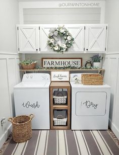 a white washer and dryer sitting inside of a laundry room