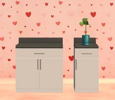 two white cabinets with plants in them against a heart - patterned wallpapered background