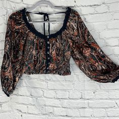 Brand New With Tags. Free People Blouse W/ Buttons, Made In The Usa. Color Is Black Combo, Size Is Xs Chic Fitted Paisley Print Tops, Cropped Floral Print Top For Night Out, Floral Print Cropped Top For Night Out, Cropped Top With Floral Print For Night Out, Chic Paisley Print Top For Day Out, Long Sleeve Paisley Print Top For Day Out, Black Paisley Print Summer Top, Casual Fitted Paisley Print Blouse, Black Paisley Print Top For Summer