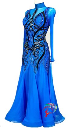 a woman's blue ballroom dress with an intricate design on the front and side