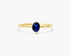 14K Yellow Gold Oval Sapphire And Diamond Birthstone Ring. This ring pairs vintage style with royal elegance. Wear this classic ring and add luxury everyday and on special occassions. Classic Oval Sapphire Ring, Classic Sapphire Ring Oval Cabochon, Elegant Birthstone Ring With Accent Stones For Formal, Elegant Formal Birthstone Ring With Accent Stones, Elegant Oval Cabochon Sapphire Ring, Elegant Birthstone Ring With Prong Setting, Elegant Sapphire Birthstone Ring With Rose Cut Diamonds, Elegant Birthstone Ring With Gemstone Accents, Elegant Diamond Ring With Gemstone Accents