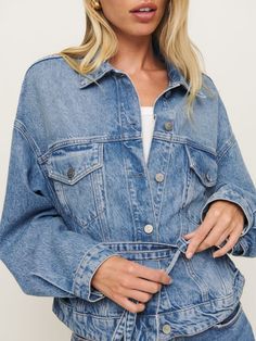 Denim time. Shop the Luna Belted Denim Jacket from Reformation, a relaxed-fit denim jacket with a collared neckline and belt at the waist. Belted Denim Jacket For Workwear, Fall Denim Jacket With Belt Loops, Casual Denim Outerwear With Belt Loops, Fall Denim Jacket With Belted Cuffs, Spring Denim Belted Outerwear, Spring Denim Blue Belted Outerwear, Utility Style Belted Denim Outerwear, Denim Blue Belted Outerwear For Spring, Fall Denim Belted Outerwear