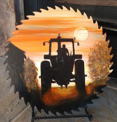 a painting of a tractor with the sun setting in the background and trees behind it