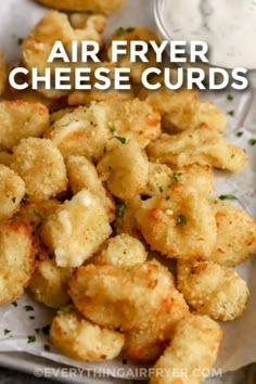 air fryer cheese curls on a white plate with parsley sprinkles