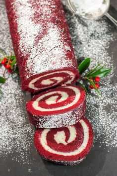 red velvet roll with powdered sugar on top