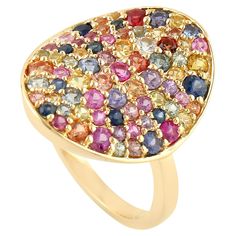 This beautiful ring has been crafted from 18-karat gold and hand set in 2.1 carats of multi color sapphires. The ring is a size 7 and may be resized to larger or smaller upon request. FOLLOW MEGHNA JEWELS storefront to view the latest collection & exclusive pieces. Meghna Jewels is proudly rated as a Top Seller on 1stDibs with 5 star customer reviews. All items manufactured by us are handmade and can be customized or redesigned. Composition Size-US-7 Total Weight-5.78 Gold Weight(Gms)-5.36 Multi Bohemian Jewels, Ruby Diamond Rings, Diamond Fashion Rings, Multi Sapphire, Gold Cocktail Ring, Contemporary Ring, Gold Cocktail, Diamond Cocktail Rings, Beautiful Ring