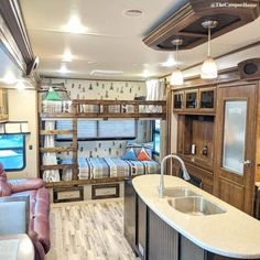 a kitchen and living room in an rv