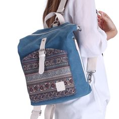 Aretha Canvas Backpack is an incredible bag thanks to its removable and adjustable straps. It can be transformed from a backpack to a crossbody bag in a fraction of a second. Its bohemian design on the front pocket makes it also fabulous. This charming style complements any outfit. The Aretha Canvas Backpack has a large storage capacity. Its large main compartment can hold a 13-inch laptop, tablet, and other daily essentials. The Aretha Canvas Backpack also has a large front pocket and two large Bohemian Leather Backpack With Adjustable Strap, Everyday Bohemian Leather Backpack, Bohemian Leather Backpack For Everyday Use, Bohemian Leather Backpack For Everyday, Adjustable Canvas Bags For Everyday Use, Bohemian Tote Backpack With Adjustable Strap, Bohemian Everyday Backpack With Adjustable Strap, Bohemian Canvas Bags With Adjustable Strap, Bohemian Tote Backpack For Daily Use