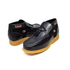 Sophisticated Meets Traditional In The Tassel From British Collection. Slip On This Leather And Suede Shoe With A Classic Old School Moc Toe And Tassel Details For A Pulled Together Look For Work Or Play! 3/4 Leather And Suede Front Classic Tassle 100% Crepe Sole 100% Handmade Side British Logo Black Leather Slip-on Shoes With Suede Lining, Black Slip-on Leather Shoes With Suede Lining, Black Suede Moc Toe Leather Shoes, Black Suede Leather Shoes For Work, Black Leather Shoes With Suede Lining For Work, British Logo, Mens Suede Chukka Boots, Mens Loafers Shoes, Suede Chukka Boots