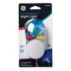 a white mouse with colorful lights on it's back side and its packaging in the front