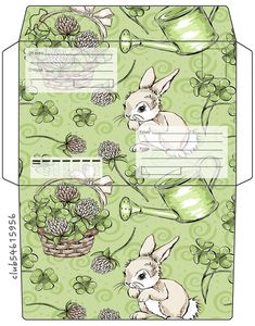 a green envelope with an image of a rabbit in the grass and pine cones on it