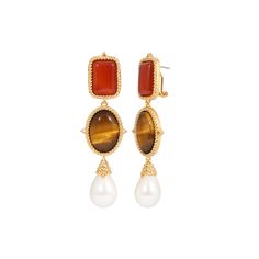 The Bianca Earrings add a touch of romance to your look with Carnelian, Tigers Eye and Pearl. Brass with 14k yellow gold overlay Genuine Carnelian Agate, Tigers Eye, Mabe Pearl Post with omega backing Approximately 2.5" in length Gold Earrings With Natural Stones For Formal Occasions, Elegant Carnelian Jewelry For Formal Occasions, Elegant Orange Gold Plated Jewelry, Elegant Gold Carnelian Jewelry, Elegant Orange Earrings With Natural Stones, Elegant Brown Carnelian Jewelry, Elegant Carnelian Drop Earrings, Elegant Orange Gold-plated Jewelry, Elegant Gold Carnelian Earrings