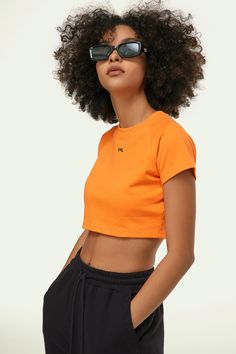 This YPL Crop Finesse Short Sleeve is the perfect addition to your wardrobe. Featuring a cropped short sleeve, on-trend silhouette and soft, sueded performance cotton, you'll get the modern style you're looking for without compromising on comfort. Plus, a signature logo on the front adds the perfect finishing touch. Sporty Cropped T-shirt With Short Sleeves For Summer, Sporty Cropped Shirt For Streetwear, Sporty Cropped T-shirt With Short Sleeves For Spring, Sporty Short Sleeve Cropped T-shirt For Spring, Sporty Short Sleeve Crop Top For Summer, Basic Cropped Shirt With Short Sleeves For Summer, Trendy Short Sleeve Crop Top, Sporty Solid Cropped T-shirt For Spring, Sporty Short Sleeve Crop Top For Spring