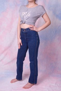 Description and item condition:Own a piece of 70's flare with these Wrangler Jeans. High waist, straight leg, and a snap button closure. Sizing & Measurements:Size: 25"Measurements:Waist: 25"Hip: 34"If you have any more questions, please ask and I'll be happy to answer! Retro High Rise Flare Jeans With Button Closure, 70s Inspired Fitted Straight Leg Jeans, Fitted Retro Medium Wash Pants, Retro Wide Leg Jeans With Button Closure, Vintage Straight Leg Jeans With Button Closure, Retro High Rise Jeans With Button Closure, Vintage Mid-rise Jeans With Button Closure, Retro High-rise Jeans With Button Closure, Retro Straight Leg Bottoms With Button Closure