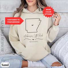 Celebrate the incredible journey of your loved one serving as a Sister Missionary for The Church of Jesus Christ of Latter-day Saints with our custom-designed hoodie! Whether you're a proud family member or the missionary herself, this unique hooded sweatshirt is the perfect way to show your support and love. Features:  »Vibrant Design: State, Country, or area of the mission with a heart right where they are serving. Name of mission in cute calligraphy with a heart and squiggly line below it wit Sister Missionary Gifts, Cute Calligraphy, Called To Serve, Lds Missionary, Sister Missionary, Sister Missionaries, Missionary Gifts, Missionary Work, Supportive Friends