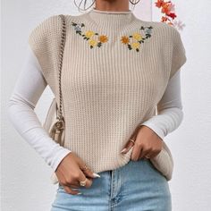 Floral Embroidered Mock Neck Sweater Vest (White Top Not Included) Spring Crew Neck Sweater Vest, Trendy Crew Neck Sweater Vest For Spring, Beige Crew Neck Sweater Vest For Spring, White Floral Embroidery Sweater For Winter, White Floral Embroidery Winter Sweater, White Winter Sweater With Floral Embroidery, White Crew Neck Sweater Vest For Spring, White Casual Sweater With Floral Embroidery, White Sweater With Floral Embroidery