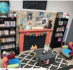 a living room filled with furniture and a fire place next to a bookshelf