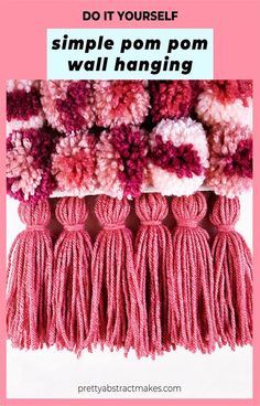 pink flowers with text that reads do it yourself simple pom wall hanging