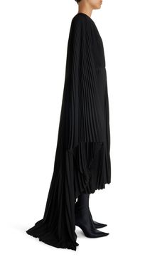 Knife-sharp pleats texture the ebony-hued georgette of this flowy, caftan-inspired dress fashioned with a plunge neck and high-low hem. 46" front length; 59" back length (size 40) Slips on over head Plunge neck Long sleeves Partially lined 100% polyester Dry clean Made in Italy Designer Clothing Black Pleated Skirt Dress For Evening, Black Evening Dress With Pleated Skirt, Black Pleated Dress With Accordion Pleats For Evening, Black Evening Pleated Dress With Pleated Skirt, Black Evening Pleated Dress, Black Accordion Pleated Dress For Evening, Black Pleated Bodice Dress For Evening, Black Evening Dress With Accordion Pleats, Silk Black Dress With Flowy Skirt